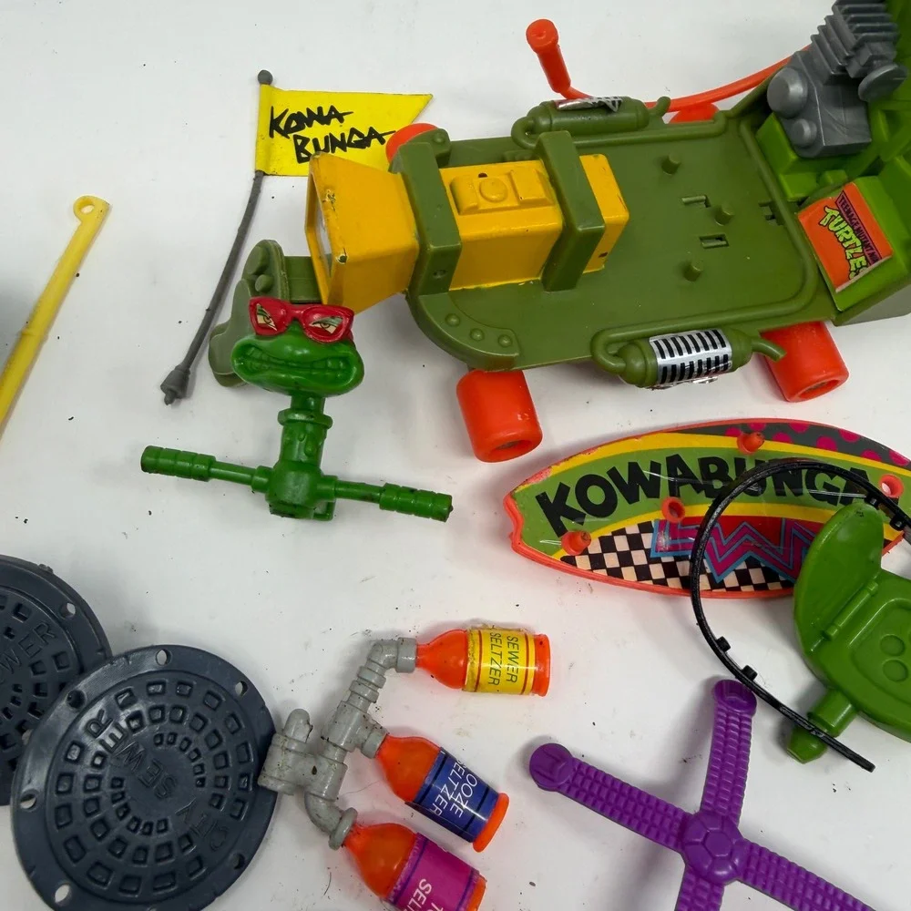 Vintage TMNT Accessories Lot Playmates Sewer Seltzer Skateboard Manhole Covers